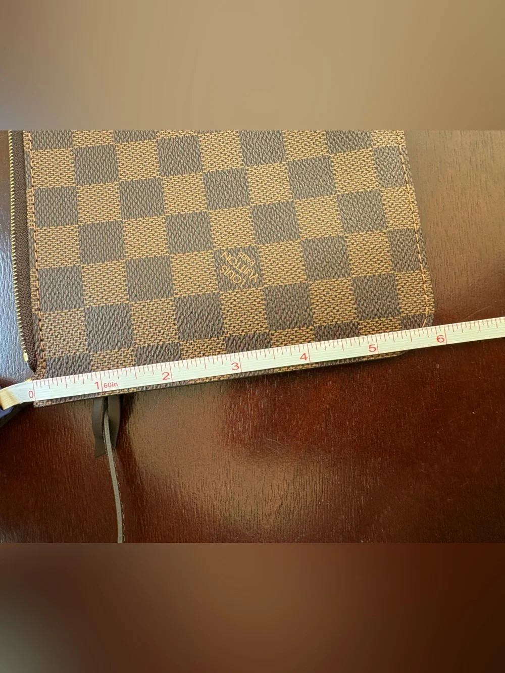 Never used Louis Vuitton Neverfull pouch